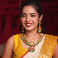 Antique Kundan stone with green onyx beads paired with kundan long earrings made with 92.5 silver