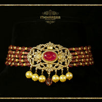 Ruby choker with Semi Precious Uncut Polkis, layered Ruby beads, and real pearl drops with matching a real pearl drop stud made with 92.5 silver