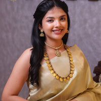 Svarnalakshmi Kasumala with Vintage Attigai