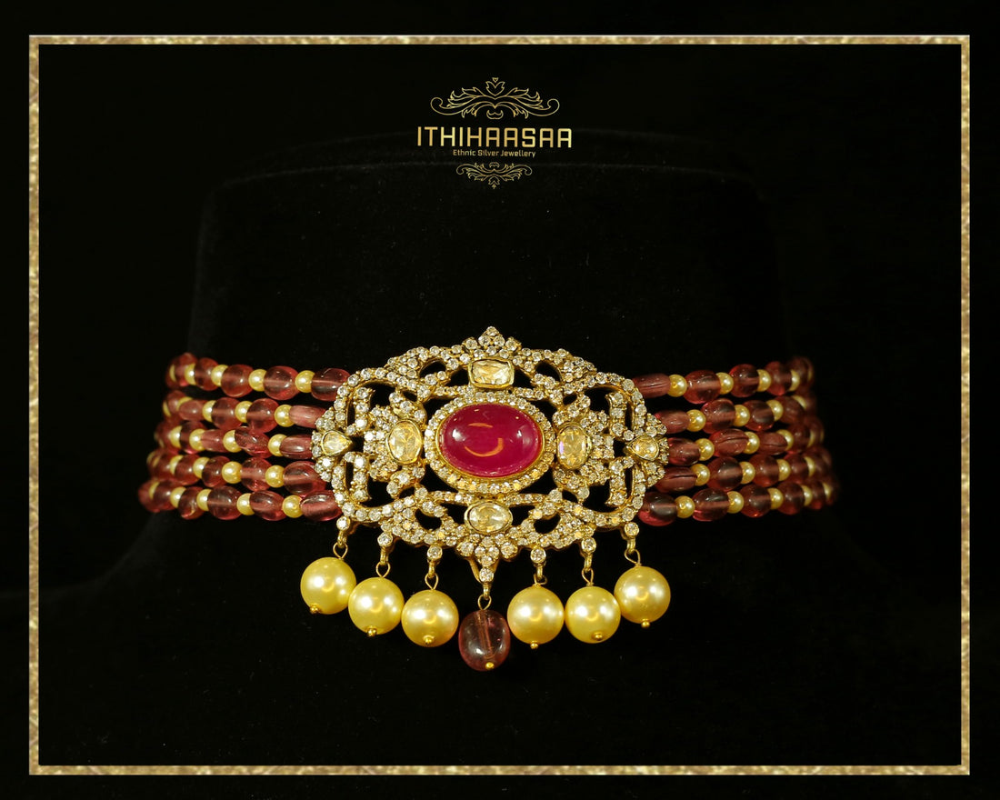 Ruby choker with Semi Precious Uncut Polkis, layered Ruby beads, and real pearl drops with matching a real pearl drop stud made with 92.5 silver