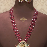  Real Pearls and Semiprecious Tourmaline beads with a sacred Ganesha pendant crafted in semi-precious Uncut Polkis and emerald stones. Paired with Uncut polki emerald Long earrings