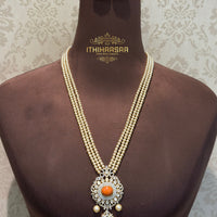 Real pearls beautifully complemented with Real Taiwanese Coral stone. Paired with Coral stud earrings with 92.5 Silver