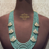Layered Aventurine beads with intricate Swan motifs paired with Uncut Polki  stud made with 9.5 silver