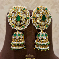 Semi precious uncut polki with emeralds handcrafted with 92.5 silver by gold karigars
